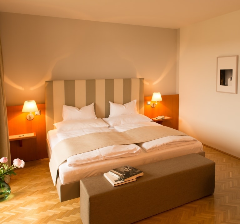 Superior double room at Schloss Segau with a big cosy double bed